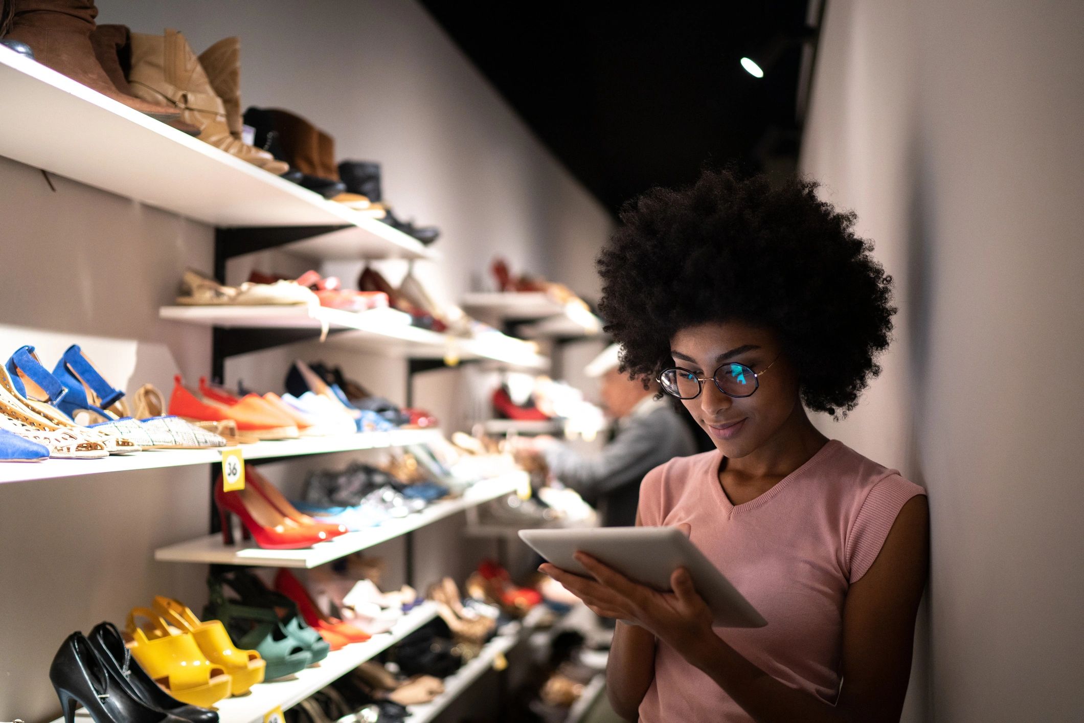 Young woman in a fashion retail setting